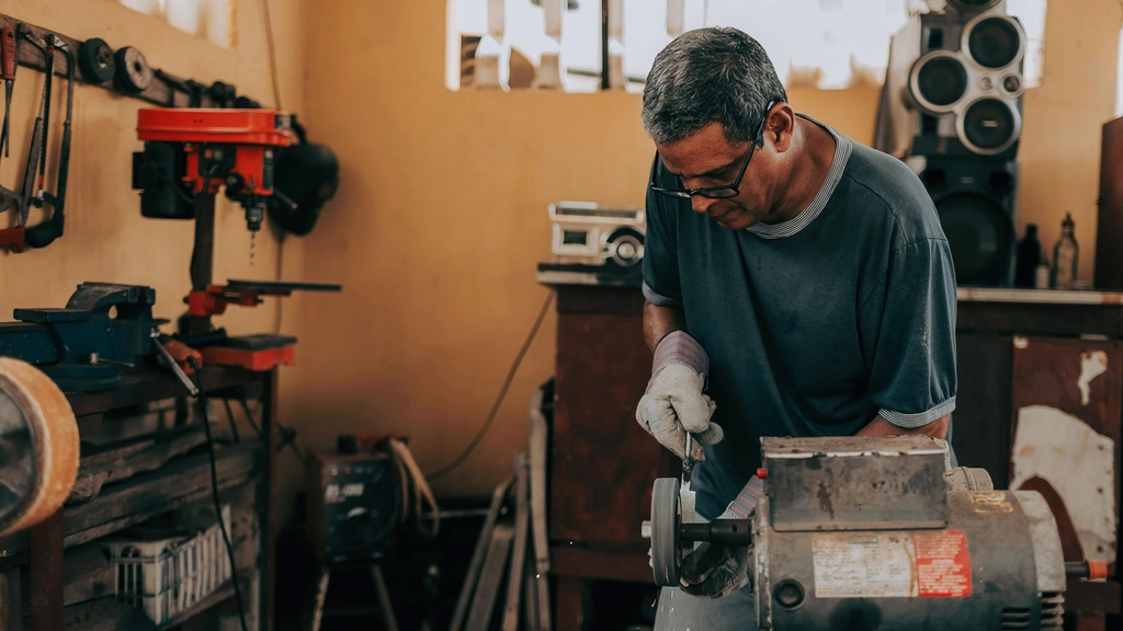 Small business owners work in mechanic shop